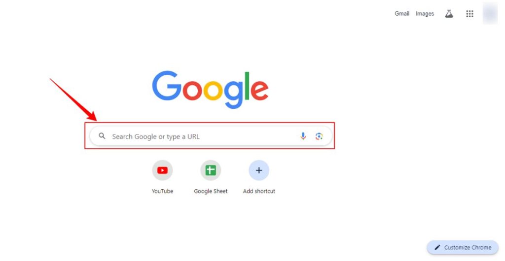 A screenshot of the Google homepage with the search bar highlighted by a red arrow and box, indicating the Omnibox.